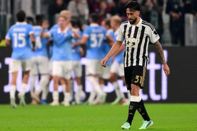 Juventus’ Argentine forward #31 Nico Gonzalez reacts as Lazio's players celebrate team's first goal during the Italian Serie A football match between Juventus and Lazio at the Allianz Stadium, in Turin on October 18, 2026. (Photo by Marco Bertorello / AFP)