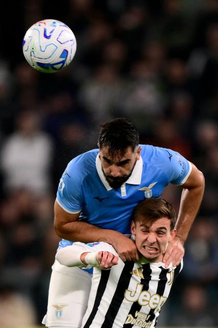Lazio’s Croatian defender #37 Josip Sutalo (L) fights for the ball with Juventus’ Portuguese forward #7 Francisco Conceicao during the Italian Serie A football match between Juventus and Lazio at the Allianz Stadium, in Turin on October 18, 2026. (Photo by Marco Bertorello / AFP)