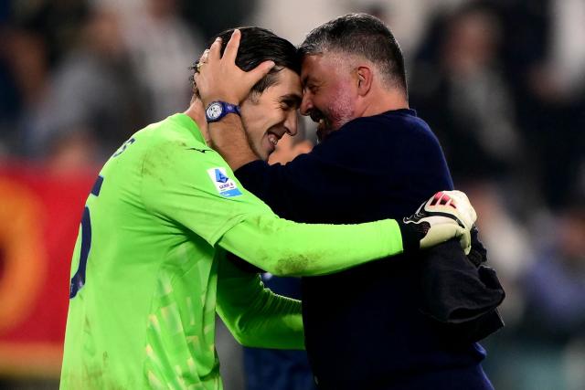 Lazio’s Greek goalkeeper #35 Christos Mandas (L) and Lazio’s Italian coach Gennaro Gattuso celebrate  after winning the Italian Serie A football match between Juventus and Lazio at the Allianz Stadium, in Turin on October 18, 2026. (Photo by Marco Bertorello / AFP)