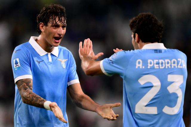 Lazio’s Italian defender #15 Romano Floriani (L) and Lazio’s Spanish defender #23 Alfonso Pedraza celebrate after winning the Italian Serie A football match between Juventus and Lazio at the Allianz Stadium, in Turin on October 18, 2026. (Photo by Marco Bertorello / AFP)