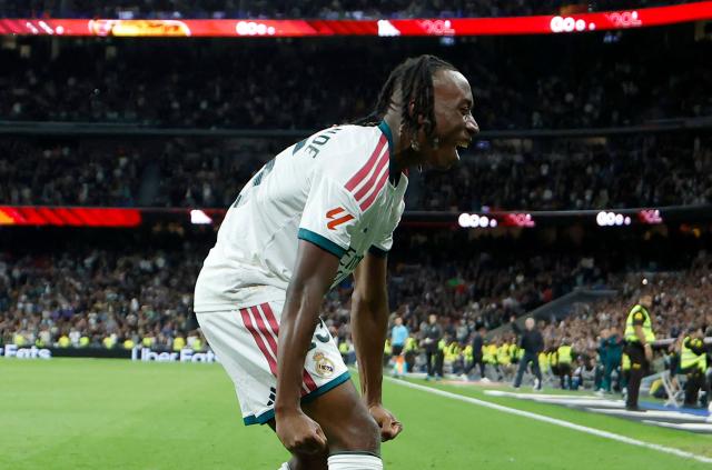 Real Madrid's Ivorian forward  #25 Yan Diomande celebrates scoring his team's fourth goal during the Spanish league football match between Real Madrid CF and Sevilla FC at the Santiago Bernabeu stadium in Madrid on October 18, 2026. (Photo by Oscar DEL POZO / AFP)