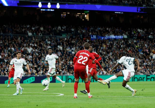 Real Madrid's Ivorian forward  #25 Yan Diomande scores his team's fourth goal during the Spanish league football match between Real Madrid CF and Sevilla FC at the Santiago Bernabeu stadium in Madrid on October 18, 2026. (Photo by Oscar DEL POZO / AFP)