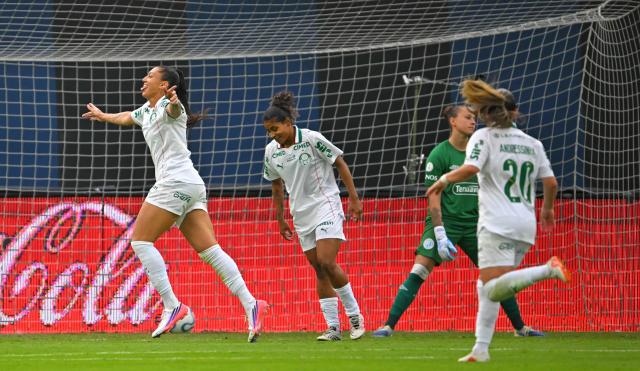 Palmeiras' forward #10 Bia Zaneratto (L) celebrates after scoring her team's third goal during the 2026 Women's Copa Libertadores Group B football match between Argentina's Belgrano and Brazil's Palmeiras at the Banco Guayaquil Stadium in Quito on October 18, 2026. (Photo by Rodrigo BUENDIA / AFP)