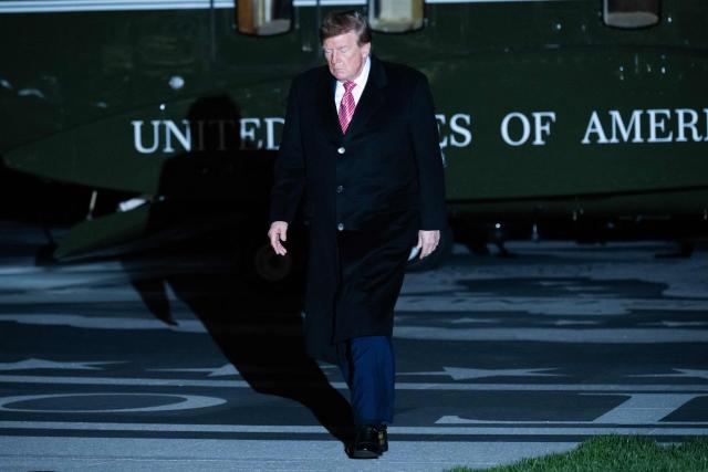 US President Donald Trump walks across the South Lawn after arriving on Marine One at the White House in Washington, DC, October 18, 2026. President Trump is returning to Washington, DC, after campaigning in Georgia and Kentucky over the weekend. (Photo by SAUL LOEB / AFP)
