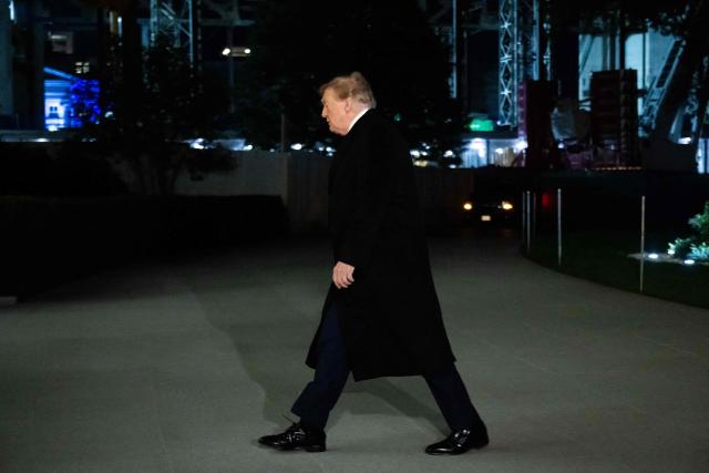 US President Donald Trump walks across the South Lawn after arriving on Marine One at the White House in Washington, DC, on October 18, 2026. President Trump is returning to Washington, DC, after campaigning in Georgia and Kentucky over the weekend. (Photo by SAUL LOEB / AFP)