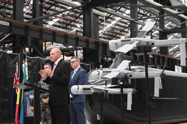 Anduril Australia & Asia Pacific CEO and Executive Chairman David Goodrich speaks to the media in front of the Ghost Shark autonomous undersea vehicle at an Anduril facility in Sydney on October 19, 2026, during the unveiling of three new autonomous systems capabilities under AUKUS Pillar II. (Photo by Saeed KHAN / AFP)