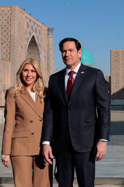 US Secretary of State Marco Rubio and his wife Jeanette Dousdebes Rubio pose for a photograph at Registan Square in Samarkand, Uzbekistan, on October 19, 2026. (Photo by Kylie Cooper / POOL / AFP)
