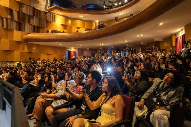 People attend the Film Archive Medal of the National Autonomous University of Mexico (UNAM) for Mexican director Guillermo del Toro during the Morelia Film Festival in Morelia, Michoacan, Mexico on October 18, 2026. (Photo by Enrique Castro / AFP)