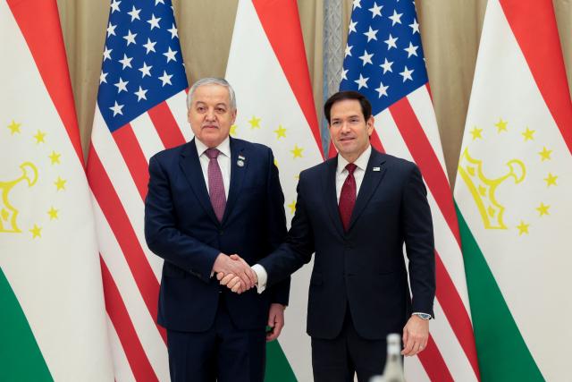 US Secretary of State Marco Rubio (R) meets with Tajikistan's Foreign Minister Sirojiddin Muhriddin at the Congress Center in Samarkand, Uzbekistan, on October 19, 2026. (Photo by Kylie Cooper / POOL / AFP)