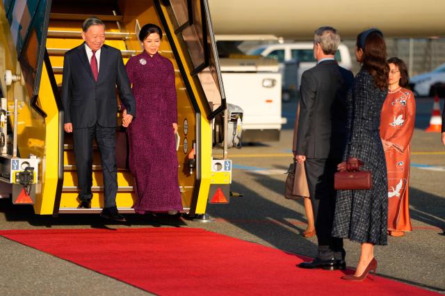 Denmark's royal couple King Frerderik (2ndR) and Queen Mary (R) welcome Vietnam's President, To Lam (L), and his spouse, Ngo Phuong Ly at Copenhagen Airport's Vilhelm Lauritzen Terminal, on October 19, 2026. Vietnam's President, To Lam, and his spouse, Ngo Phuong Ly, begin a three-day state visit to Denmark. This year marks the 55th anniversary of the establishment of diplomatic relations between Denmark and Vietnam. (Photo by Liselotte Sabroe / Ritzau Scanpix / AFP) / Denmark OUT