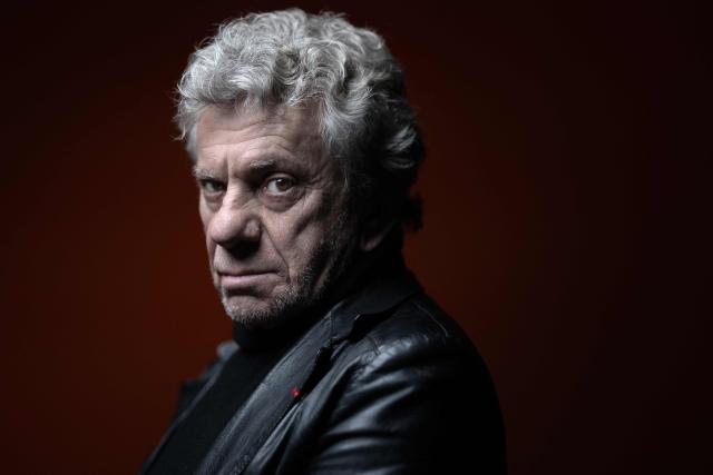(FILES) French conflict photojournalist Patrick Chauvel poses during a photo session in Paris on October 13, 2026. For 56 years, he has covered almost every war, from Vietnam to Ukraine: French photojournalist Patrick Chauvel has lived "1,000 lives" and risked his own skin, driven by the ambition to bear witness. "So that we never again hear people say, 'We didn't know,'" he explains. At 77, he has not put away his camera; just recently, he returned to Ukraine—his second trip there this year. "I’ll keep going as long as my body holds up, as long as I can run and see," he told AFP, just days before the release on October 21, 2026, of his memoir, "Eclats de guerre" ("Fragments of War"). (Photo by Joel Saget / AFP)