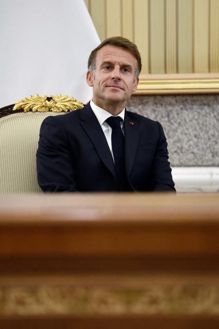 French President Emmanuel Macron attends an agreement-signing ceremony with the Emir of Kuwait at the Bayan Palace, in Kuwait City on October 19, 2026. The French president arrived in Kuwait on October 19, beginning a tour of four Gulf countries, Kuwait, UAE, Bahrain and Qatar. (Photo by Benoit Tessier / POOL / AFP)