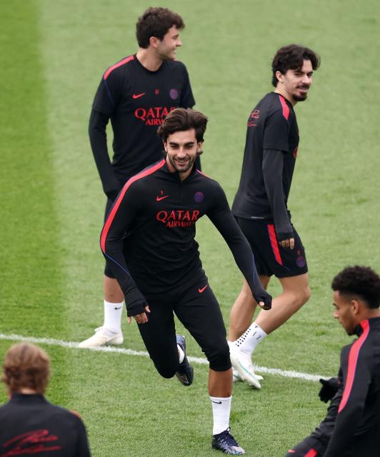 PSG's Spanish forward #09  Ferran Torres (C) attends a training session at the Campus Paris Saint-Germain in Poissy, on October 19, 2026, on the eve of the UEFA Champions League first round day 3 football match against Barcelona. (Photo by FRANCK FIFE / AFP)