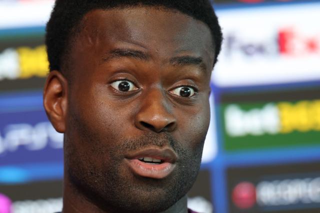 Manchester City's English defender #06 Marc Guehi speaks during a press conference at the Etihad Campus training ground in Manchester, north-west England, on October 19, 2026, the eve of their UEFA Champions League, league phase football match against AEK Athens. (Photo by Darren Staples / AFP)