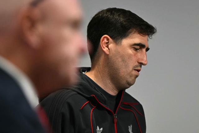 Liverpool's Spanish head coach Andoni Iraola leaves having help a press conference at Anfield in Liverpool, north-west England on October 19, 2026, the eve of their UEFA Champions League, league phase football match against Villarreal. (Photo by Paul ELLIS / AFP)