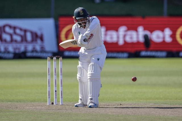 TOPSHOT - South Africa's Temba Bavuma plays a shot on day two of the second Test match between South Africa and Australia at St Georges Park in Gqeberha on October 19, 2026. (Photo by Marco Longari / AFP)
