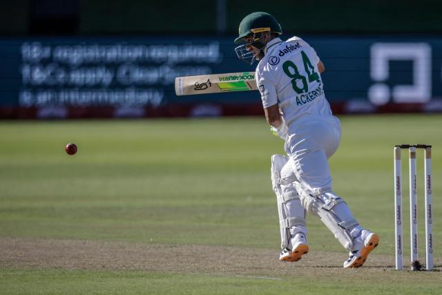 TOPSHOT - South Africa's Marques Ackerman plays a shot on day two of the second Test match between South Africa and Australia at St Georges Park in Gqeberha on October 19, 2026. (Photo by Marco Longari / AFP)