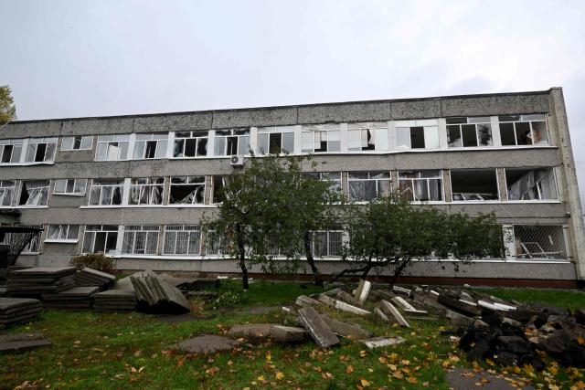 This photograph shows a school damaged following a Russian ballistic missile attack in Kyiv on October 19, 2026, amid the Russian invasion of Ukraine. (Photo by Sergei SUPINSKY / AFP)