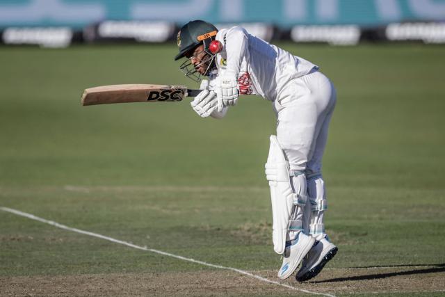 TOPSHOT - South Africa's Temba Bavuma plays a shot on day two of the second Test match between South Africa and Australia at St Georges Park in Gqeberha on October 19, 2026. (Photo by Marco Longari / AFP)