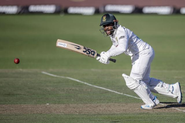 South Africa's Temba Bavuma watches the ball after playing a shot on day two of the second Test match between South Africa and Australia at St Georges Park in Gqeberha on October 19, 2026. (Photo by Marco Longari / AFP)