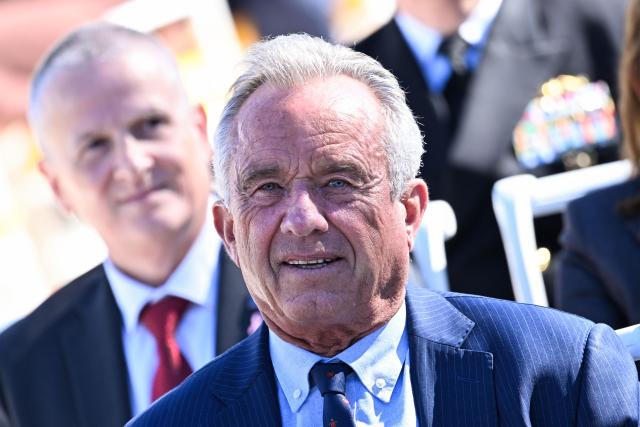 US Secretary of Health and Human Services Robert F. Kennedy Jr. looks on before President Donald Trump and First Lady Melania Trump arrive for an executive order signing ceremony in the Rose Garden of the White House in Washington, DC, on October 19, 2026. The executive order aims to a create a Women’s Health Division at the National Institutes of Health (NIH) and a White House Women’s Health Task Force. (Photo by Brendan SMIALOWSKI / AFP)