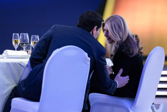 US Secretary of State Marco Rubio speaks to his wife Jeanette Dousdebes Rubio after delivering a speech during a dinner with Uzbekistan's President Shavkat Mirziyoyev and the American-Uzbek Business and Investment Council (AUBIC) at the Congress Center in Samarkand on October 19, 2026. (Photo by Kylie Cooper / POOL / AFP)