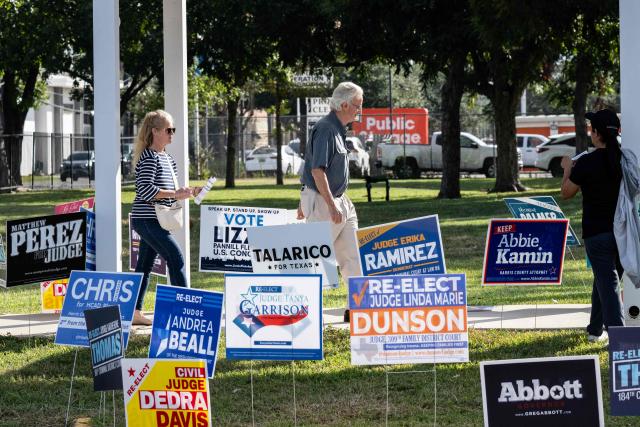 People arrive at a polling location on the first day of early voting in Texas for the midterm elections, at the West Gray Metropolitan Multiservice Center in Houston, Texas, on October 19, 2026. Democrat James Talarico is facing Republican and Texas Attorney General Ken Paxton in a race for one of Texas's US Senate seats. No Democrat has won statewide office in the conservative southern state since 1994, and Trump carried Texas by nearly 14 percentage points in the 2024 presidential election. (Photo by RONALDO SCHEMIDT / AFP)