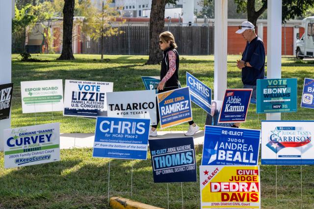 People depart a polling location on the first day of early voting in Texas for the midterm elections, at the West Gray Metropolitan Multiservice Center in Houston, Texas, on October 19, 2026. Democrat James Talarico is facing Republican and Texas Attorney General Ken Paxton in a race for one of Texas's US Senate seats. No Democrat has won statewide office in the conservative southern state since 1994, and Donald Trump carried Texas by nearly 14 percentage points in the 2024 presidential election. (Photo by RONALDO SCHEMIDT / AFP)