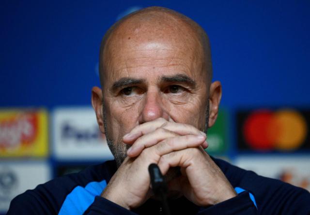 PSV Eindhoven’s coach Peter Bosz attends a press conference ahead of their UEFA Champions League first round day 3 football match against FC Porto, at the Dragao Stadium in Porto, on October 19, 2026 (Photo by MIGUEL RIOPA / AFP)