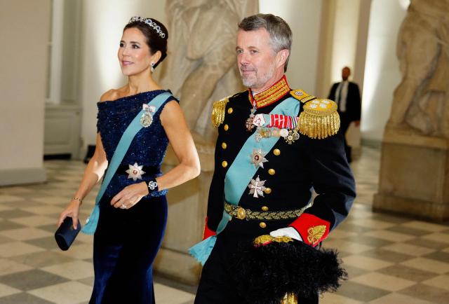 Denmark's King Frederik and Denmark's Queen Mary arrive at the gala dinner held for Vietnam's President, To Lam, and his spouse, Ngo Phuong Ly, at Christiansborg Palace in Copenhagen, Denmark, on October 19, 2026. Vietnam's President, To Lam, and his spouse, Ngo Phuong Ly, begin a three-day state visit to Denmark. This year marks the 55th anniversary of the establishment of diplomatic relations between Denmark and Vietnam. (Photo by Mads Claus Rasmussen / Ritzau Scanpix / AFP) / Denmark OUT