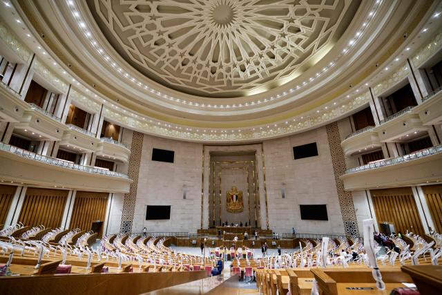 (FILES) The interior of the new headquarters for the House of Representatives, the lower house of the Egyptian Parliament, is pictured at the New Administrative Capital megaproject about 45 kilometres east of the current capital Cairo on August 1, 2023. Egypt's parliament on October 19, 2026 delayed a debate on President Abdel Fattah al-Sisi's request to authorise military support for Saudi Arabia until next week, state media reported, after an emergency session ended without a decision a day earlier. (Photo by Khaled DESOUKI / AFP)