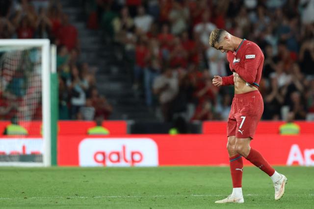 (FILES) Portugal's forward #07 Cristiano Ronaldo leaves the pitch after being substituted during the UEFA Nations League league phase group A4 football match between Portugal and Wales at Jose Alvalade stadium in Lisbon on September 24, 2026. Cristiano Ronaldo has been sanctioned by 30 days of suspension following his decision to walk out on the national team, according the Portuguese Federation, AFP reports on October 19, 2026. (Photo by PATRICIA DE MELO MOREIRA / AFP)