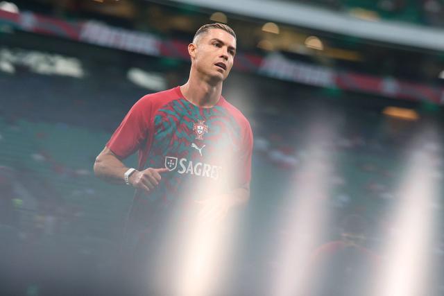(FILES) Portugal's forward #07 Cristiano Ronaldo warms up ahead of the UEFA Nations League league phase group A4 football match between Portugal and Wales at Jose Alvalade stadium in Lisbon on September 24, 2026. Cristiano Ronaldo has been sanctioned by 30 days of suspension following his decision to walk out on the national team, according the Portuguese Federation, AFP reports on October 19, 2026. (Photo by Patricia de Melo Moreira / AFP)