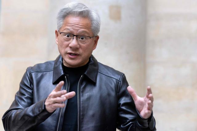 (FILES) Co-founder, President and CEO of US technology company Nvidia, Jensen Huang, gestures during a press briefing in Paris on October 13, 2026. The German government announced a partnership on October 19, 2026 with US chipmaking giant Nvidia aimed at accelerating the development of artificial intelligence for industrial applications.
The partnership, which was signed during an investment summit in Berlin, is intended to help develop "cutting-edge" industrial AI models that draw upon German data and industrial expertise, according to the government statement. (Photo by Joel Saget / AFP)
