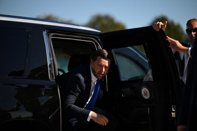 US Vice President JD Vance exits his motorcade as he boards Air Force Two at Asheville Regional Airport in Fletcher, North Carolina, on October 19, 2026. Vance attended a rally in Hendersonville, North Carolina, ahead of the midterm elections. (Photo by Kenny Holston/The New York Times / POOL / AFP)