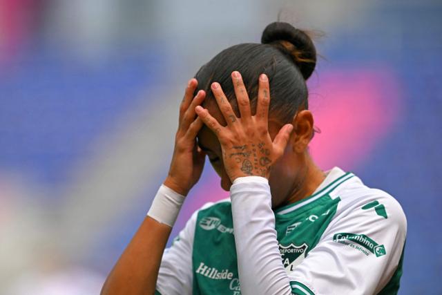 Deportivo Cali's forward #20 Karla Viancha reacts after missing a chance to score during the 2026 Women's Copa Libertadores Group D football match between Colombia's Deportivo Cali and Uruguay's Nacional at the Banco Guayaquil Stadium in Quito on October 19, 2026. (Photo by Rodrigo BUENDIA / AFP)
