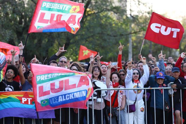 Supporters of Brazil's President and presidential candidate Luiz Inacio Lula da Silva of the Workers' Party (PT) attend a rally in Porto Alegre, Rio Grande do Sul state, Brazil, on October 19, 2026, ahead of the presidential runoff election. (Photo by SILVIO AVILA / AFP)