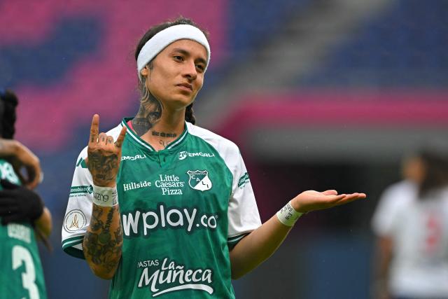 Deportivo Cali's forward #18 Ingrid Guerra celebrates scoring the opening goal during the 2026 Women's Copa Libertadores Group D football match between Colombia's Deportivo Cali and Uruguay's Nacional at the Banco Guayaquil Stadium in Quito on October 19, 2026. (Photo by Rodrigo BUENDIA / AFP)