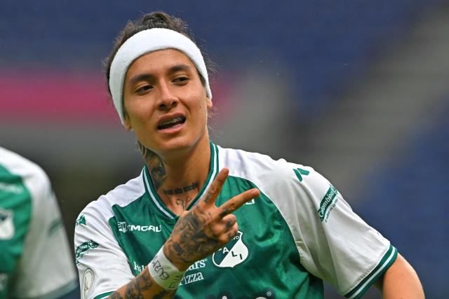 Deportivo Cali's forward #18 Ingrid Guerra celebrates scoring the opening goal during the 2026 Women's Copa Libertadores Group D football match between Colombia's Deportivo Cali and Uruguay's Nacional at the Banco Guayaquil Stadium in Quito on October 19, 2026. (Photo by Rodrigo BUENDIA / AFP)