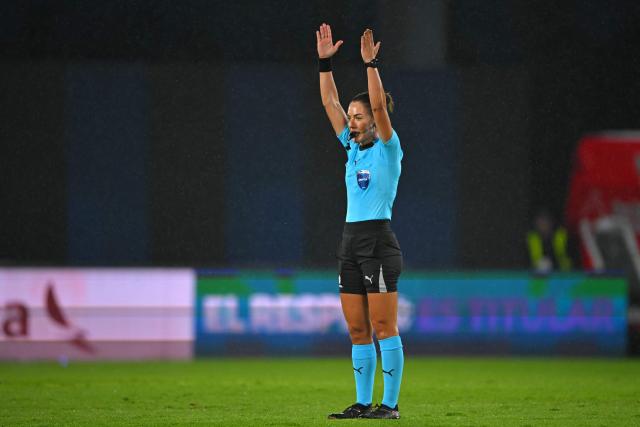 Brazilian referee Daiane Caroline Muniz gestures at the end of the 2026 Women's Copa Libertadores Group D football match between Colombia's Deportivo Cali and Uruguay's Nacional at the Banco Guayaquil Stadium in Quito on October 19, 2026. (Photo by Rodrigo BUENDIA / AFP)
