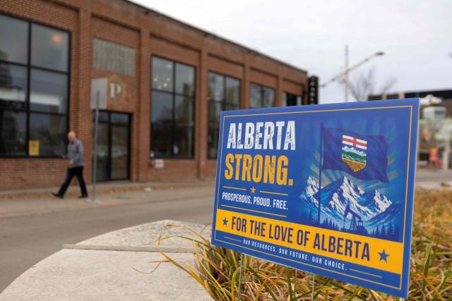 A sign in support of separatism sits in front of the Parlour in downtown Edmonton, Alberta, on October 19, 2026. Alberta votes today to determine if it wants to pursue a binding referendum on leaving Canada, with Prime Minister Mark Carney warning a separatist win would bring dangerous uncertainty during a trade war with the United States. Polls indicate less than a quarter of people in the western Canadian province support independence. (Photo by Megan Albu / AFP)