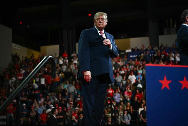 US President Donald Trump looks on during a campaign rally at the Heartland Credit Union Arena in Park City, Kansas, a suburb of Wichita, on October 19, 2026. (Photo by Kent NISHIMURA / AFP)