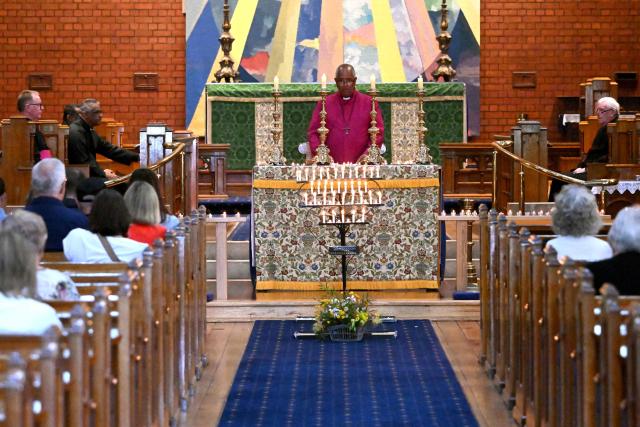Candles are lit during a prayer vigil for Australian politician Helen Haines at the Holy Trinity Cathedral in the northern regional city of Wangaratta, some 250 kilometres north-east of Melbourne on October 20, 2026. Australian lawmaker Helen Haines has lost a leg after being struck by a car in a deliberate attack, local media said October 20. (Photo by William WEST / AFP)