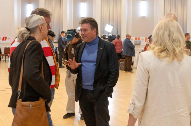 Thomas Lukaszuk, former Alberta deputy premier and leader of the Forever Canadian campaign, speaks with supporters advocating for Alberta to remain part of Canada at a rally at Polish Hall in downtown Edmonton, Alberta, ahead of the referendum results on October 19, 2026. Alberta votes today to determine if it wants to pursue a binding referendum on leaving Canada, with Prime Minister Mark Carney warning a separatist win would bring dangerous uncertainty during a trade war with the United States. Polls indicate less than a quarter of people in the western Canadian province support independence. (Photo by Megan Albu / AFP)
