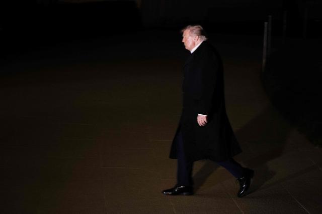 US President Donald Trump walks across the South Lawn after arriving on Marine One at the White House in Washington, DC, on October 19, 2026. President Trump is returning from Wichita, Kansas where he held a campaign rally ahead of the midterm elections. (Photo by Brendan Smialowski / AFP)