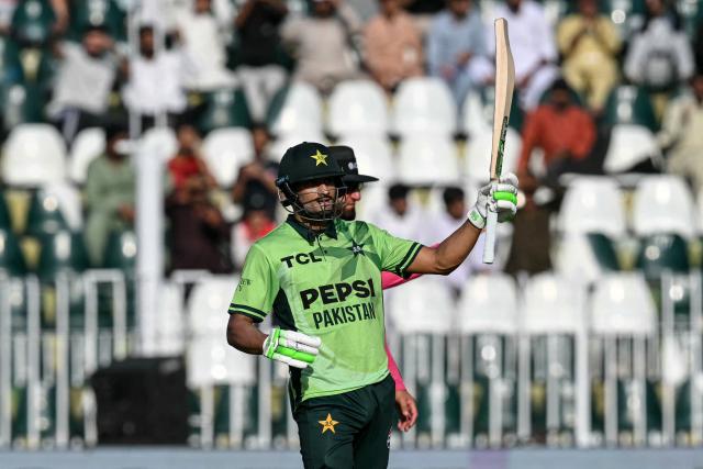 Pakistan's Hasan Nawaz celebrates after scoring a half-century (50 runs) during the one-day international (ODI) tri-series cricket match between Pakistan and England at the Rawalpindi Cricket Stadium in Rawalpindi on October 20, 2026. (Photo by Aamir QURESHI / AFP)