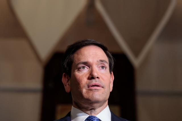 US Secretary of State Marco Rubio speaks to the media upon his arrival at the Taj Mahal Palace Hotel in Mumbai on October 20, 2026. (Photo by Kylie Cooper / POOL / AFP)