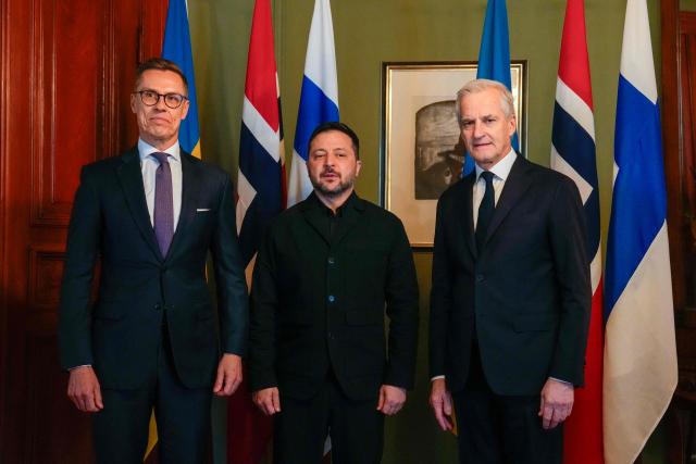 Ukraine's President Volodymyr Zelensky (C) poses for a photo with Norway's Prime Minister Jonas Gahr Store (R) and Finnish President Alexander Stubb (L) in Oslo, Norway, on October 20, 2026. Ukraine President Volodymyr Zelensky will hold talks with top US envoys in Norway, after accusing the United States of deliberately delaying the delivery of interceptor missiles to his war-torn country. Norway's Prime Minister Jonas Gahr Store said Oslo would host talks between Zelensky and US envoys Steve Witkoff and Jared Kushner -- the latter taking part remotely -- as well as Finnish President Alexander Stubb, in a bid to put "diplomatic efforts on a more constructive path". (Photo by Heiko Junge / NTB / AFP) / Norway OUT