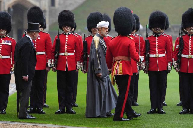 Oman's Sultan Haitham bin Tarik and Britain's King Charles III inspect the Guard of Honour in the Quadrangle at Windsor Castle, Windsor, on October 20, 2026, the first day of a three-day State Visit to the United Kingdom by The Sultan of Oman. (Photo by Jonathan Brady / POOL / AFP)
