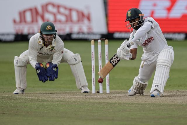 TOPSHOT - South Africa's Temba Bavuma plays a shot on day three of the second Test match between South Africa and Australia at St Georges Park in Gqeberha on October 20, 2026. (Photo by Marco Longari / AFP)